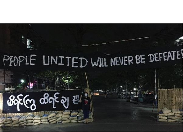 banner with the slogan: People united will never be defeted