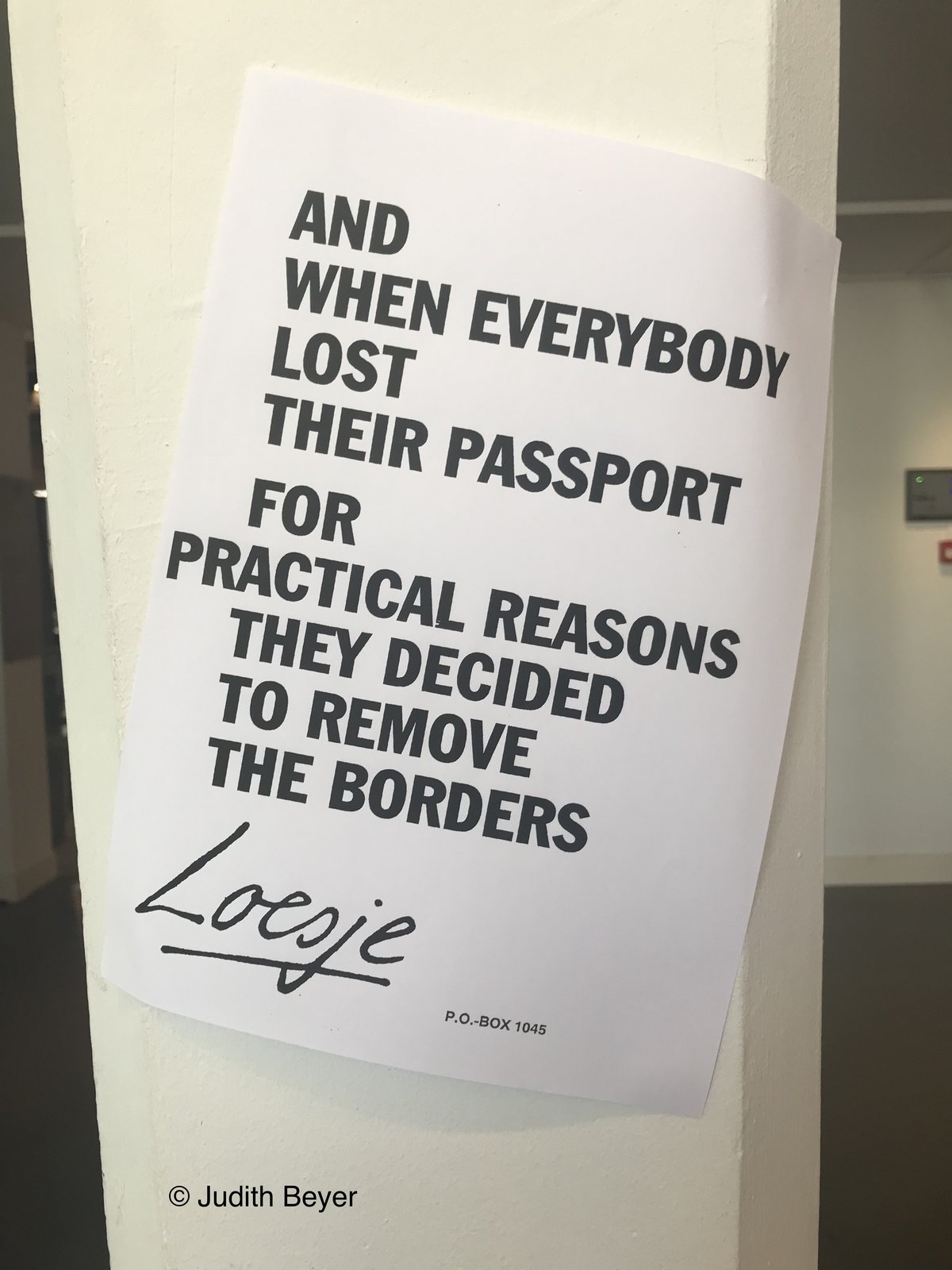A note on the wall saying: and when everbody lost their passport for practical reasons they decided to remove the boarders. 